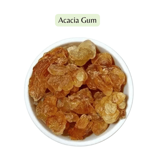White bowl filled with acacia gum on a white background