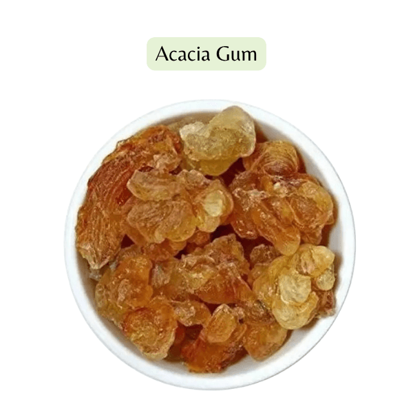 White bowl filled with acacia gum on a white background