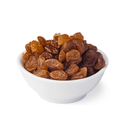 Dry Munakka Raisins in white bowl for healthy snacking
