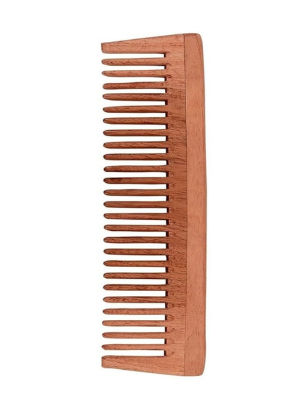 Wooden comb on a white background